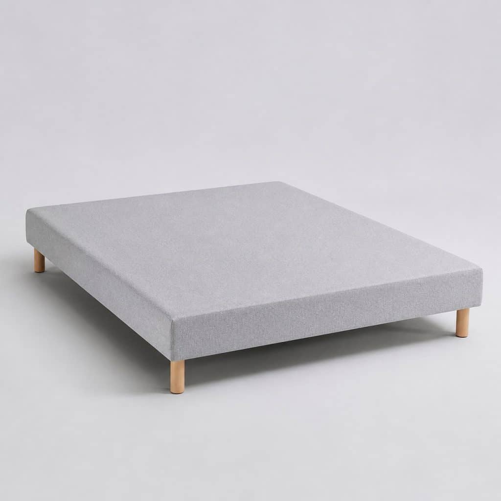 Sommier tapissier 140 x 200 cm en coutil gris clair sur pieds bois